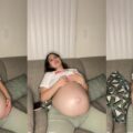 Pregnant-Hooters-Girl-Rubs-Belly-Mami-Lina.jpg